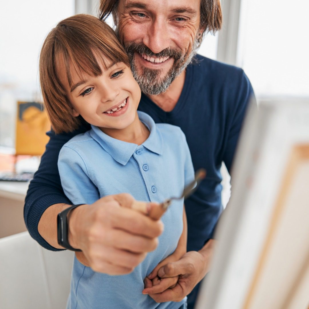 159238679_ig-post Happy dad and his son having arts and crafts time